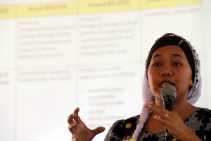 Bai-Alliah Akmad, DSWD 12 training specialist, gesture as she speaks during the CCT Bill Forum In Pikit, North Cotabato.